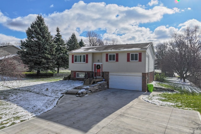 raised ranch featuring a garage