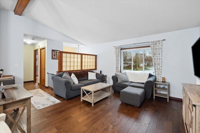 living room featuring vaulted ceiling with beams and dark hardwood / wood-style flooring