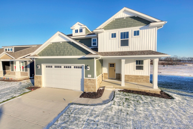 craftsman inspired home with a porch and a garage