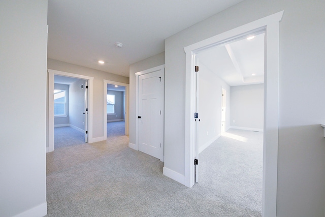 corridor with light carpet