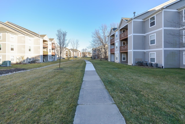 view of home's community featuring a yard