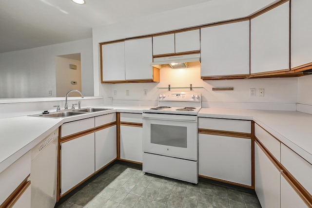 kitchen featuring white cabinets, white appliances, and sink