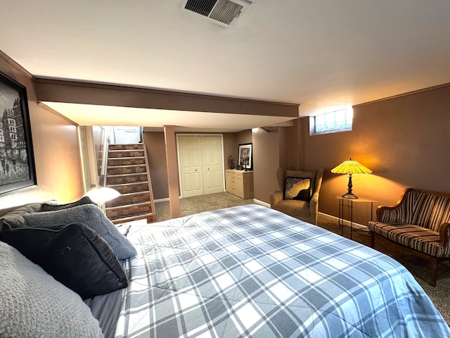 bedroom with a closet and carpet floors