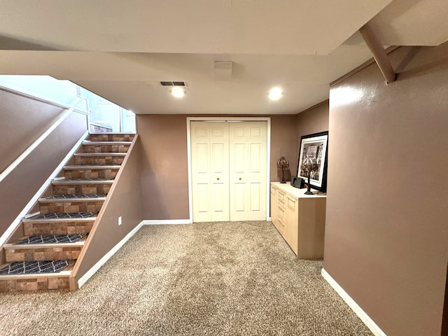 basement with carpet flooring