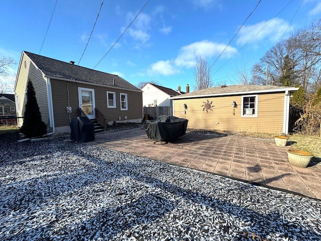 rear view of property with a patio