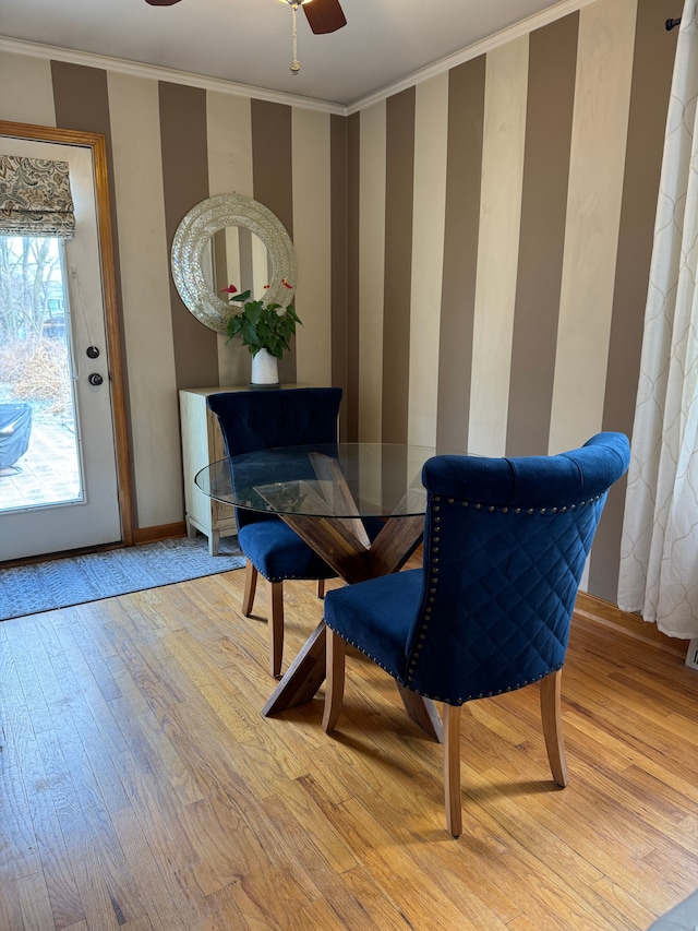 sitting room featuring crown molding, plenty of natural light, and light hardwood / wood-style floors