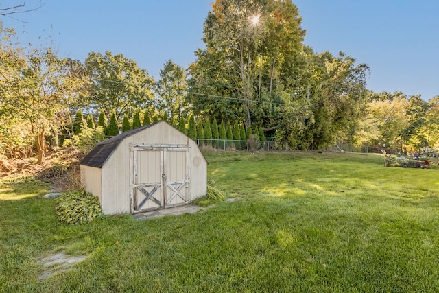 view of outdoor structure with a yard