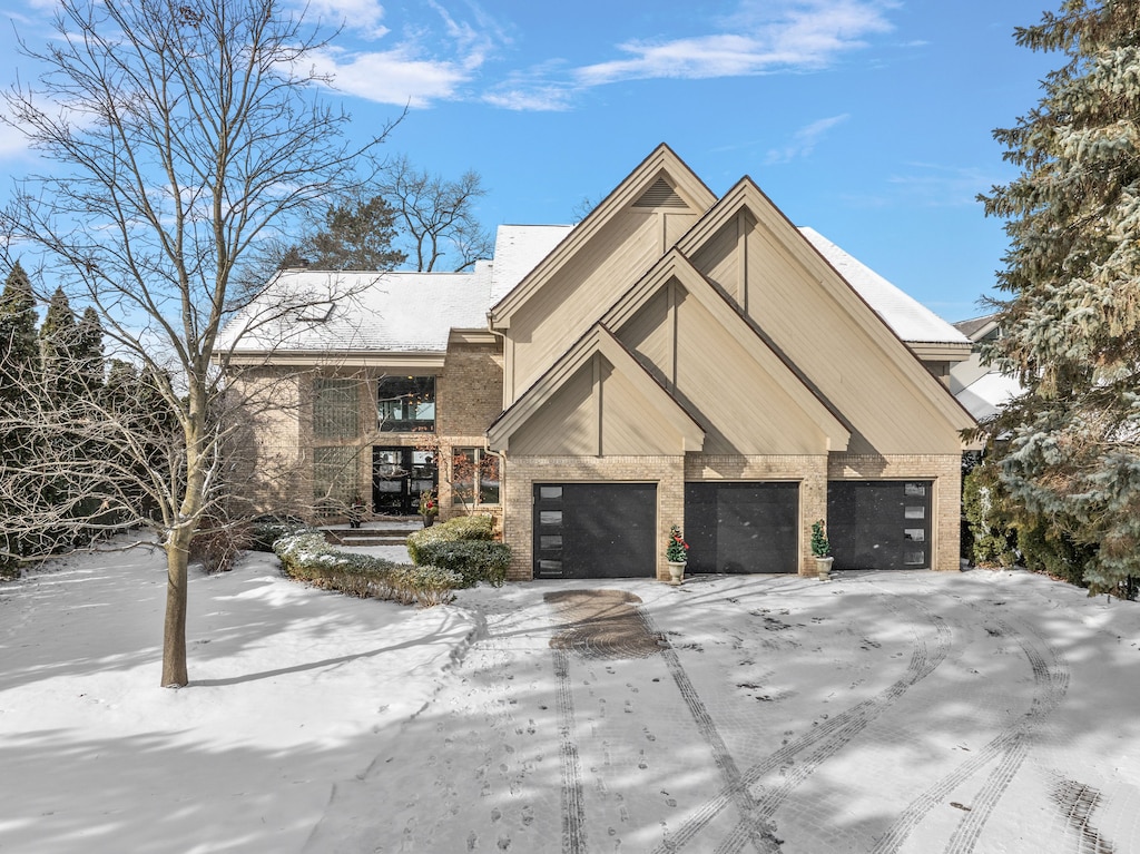 view of front of property with a garage