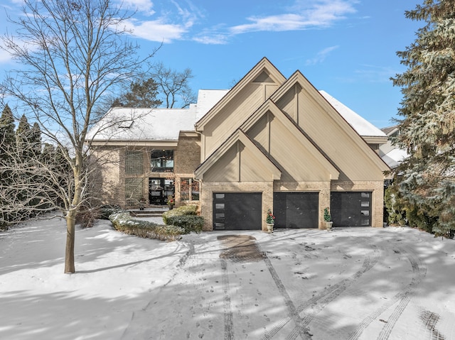 view of front of property with a garage