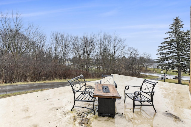 view of patio / terrace featuring a fire pit