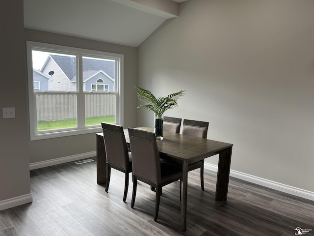 8289 Grande Lake Cir, Temperance, MI 48182 - dining space with lofted ceiling and wood finished floors