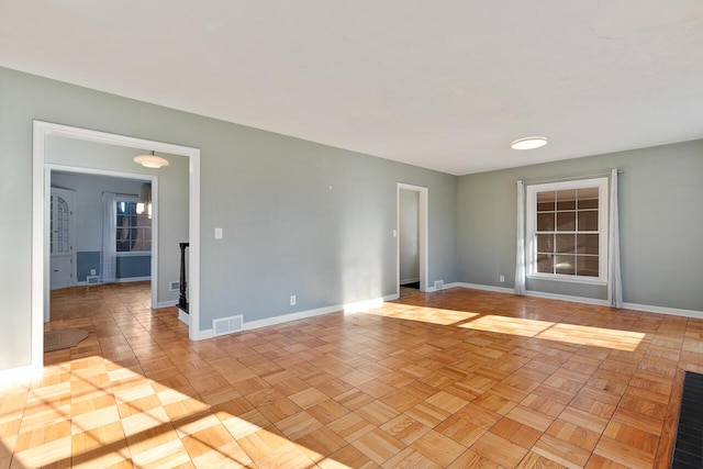 empty room featuring light parquet flooring