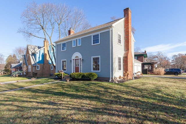 view of front of home with a front lawn