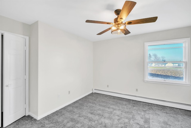 empty room with ceiling fan, a baseboard radiator, and light carpet