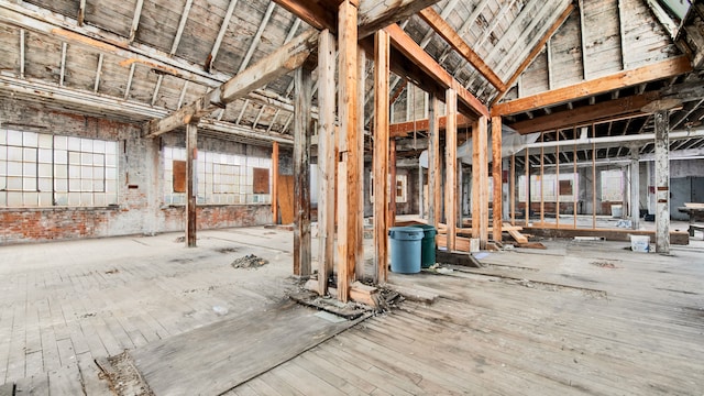 miscellaneous room with high vaulted ceiling