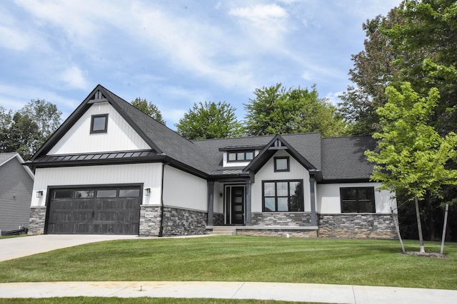 modern farmhouse with a front yard and a garage