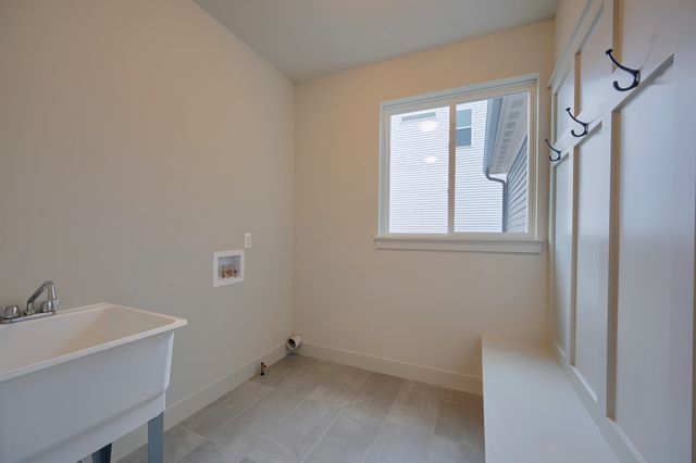 laundry area with sink and washer hookup