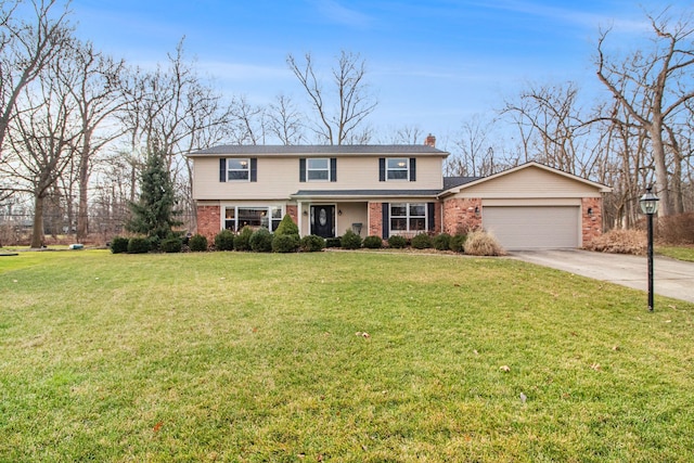 front of property with a front yard and a garage