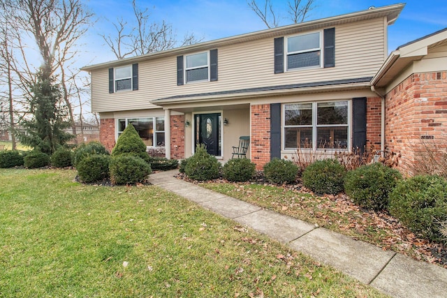 view of front of property featuring a front yard