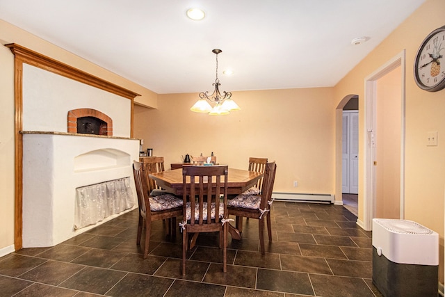 dining room featuring a baseboard radiator and a notable chandelier