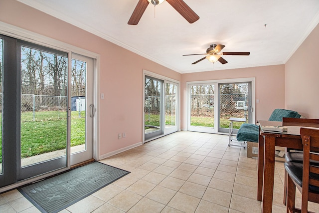 interior space with crown molding and light tile patterned flooring