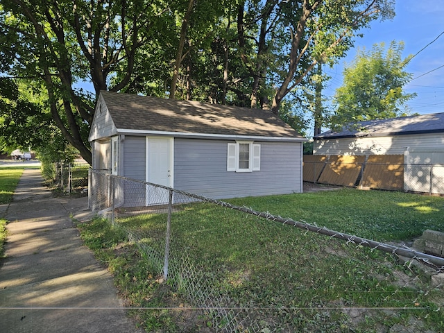 view of outdoor structure featuring a yard