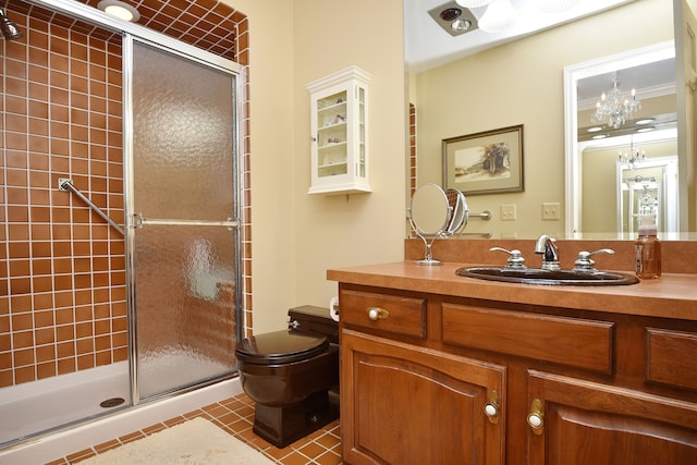 bathroom with toilet, a shower with shower door, an inviting chandelier, vanity, and tile patterned flooring