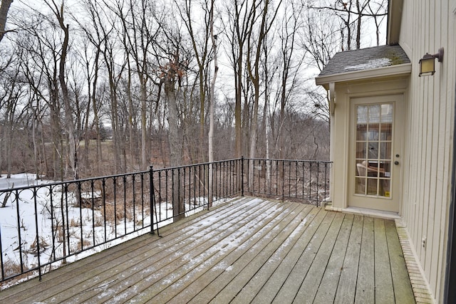 view of snow covered deck