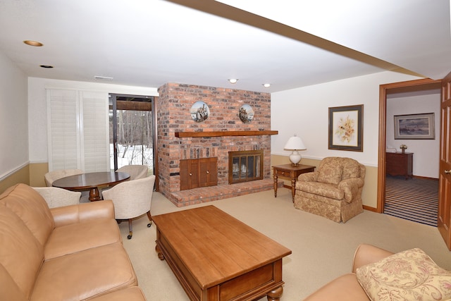 carpeted living room featuring a fireplace