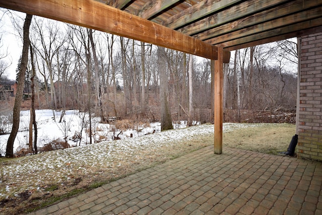 view of snow covered patio