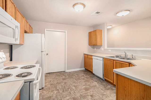 kitchen with white appliances and sink