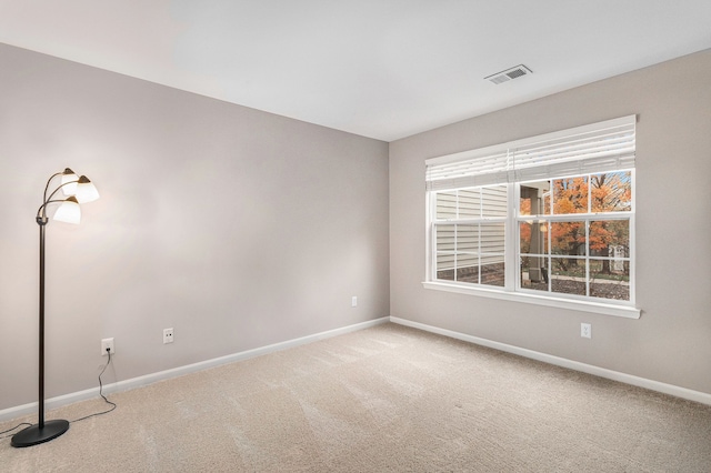 spare room with carpet flooring