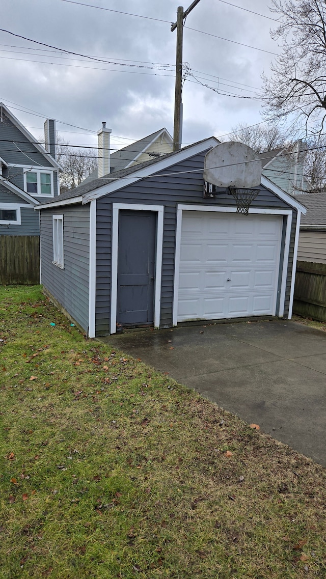 garage featuring a yard