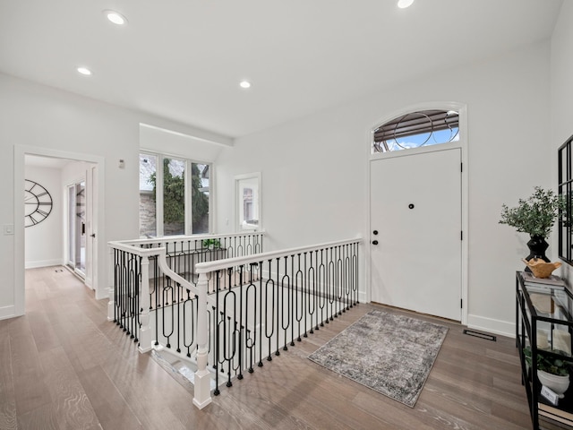 foyer with wood-type flooring