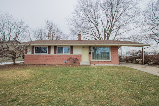 ranch-style home featuring a front yard and a carport