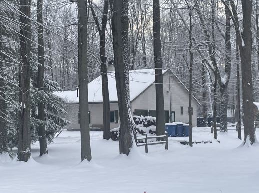 view of snow covered property