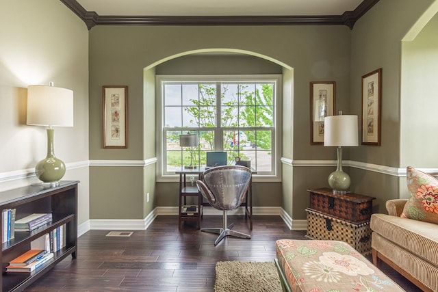 interior space featuring crown molding and dark hardwood / wood-style floors