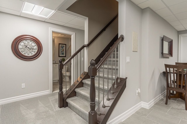 stairway with a drop ceiling