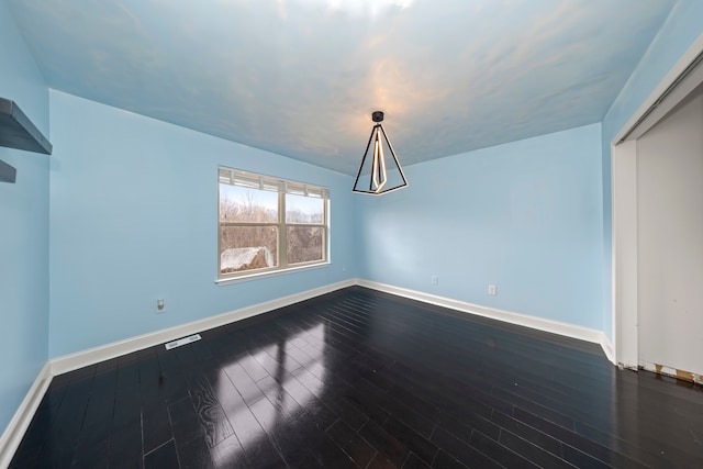 unfurnished dining area featuring hardwood / wood-style flooring