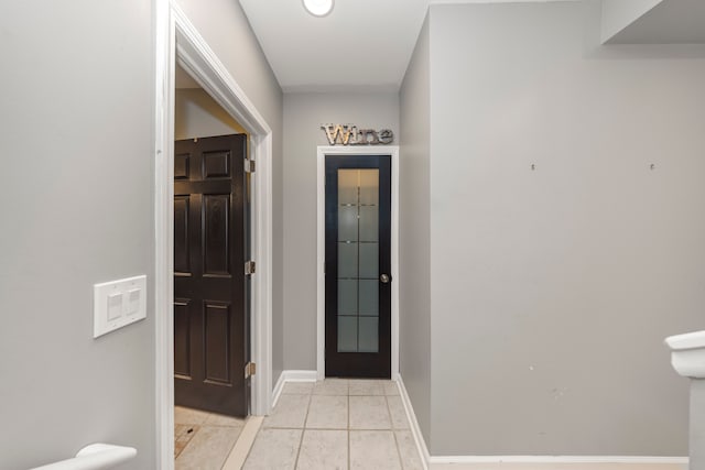 entryway featuring light tile patterned floors