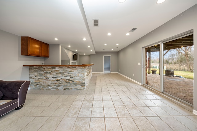 interior space with light tile patterned flooring