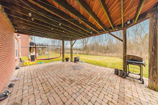 view of patio featuring a grill