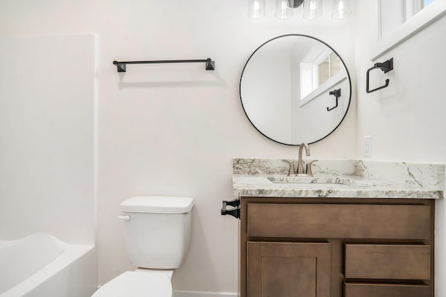 full bathroom with vanity, toilet, and shower / washtub combination