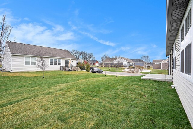9177 Cottage Xing Unit 28, Richland, MI 49083 - view of grassy yard featuring a residential view