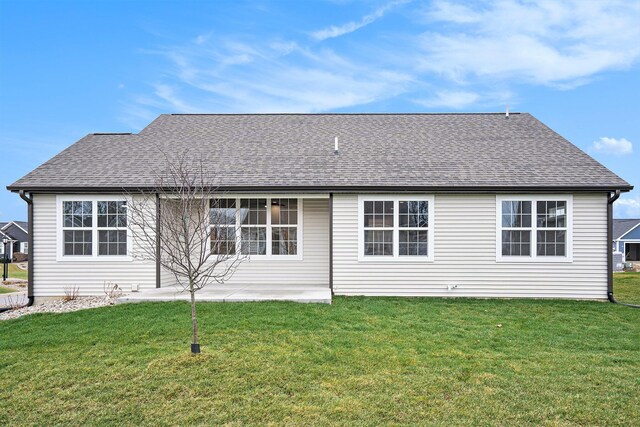 9177 Cottage Xing Unit 28, Richland, MI 49083 - rear view of house with a lawn and a shingled roof