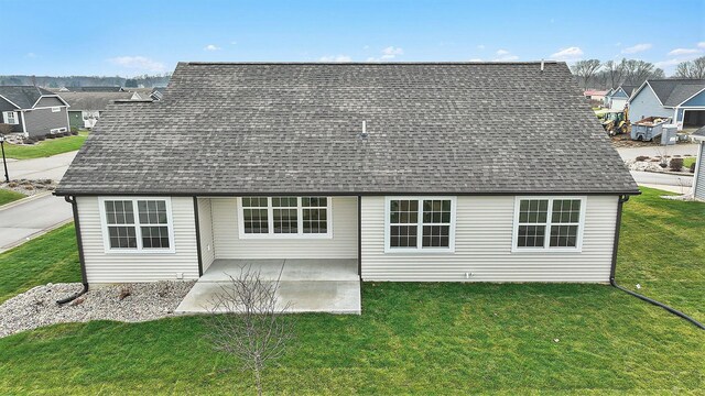 9177 Cottage Xing Unit 28, Richland, MI 49083 - back of property with a patio, a yard, and a residential view