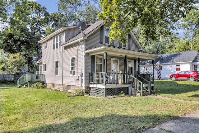 view of front of property featuring a porch and a front yard