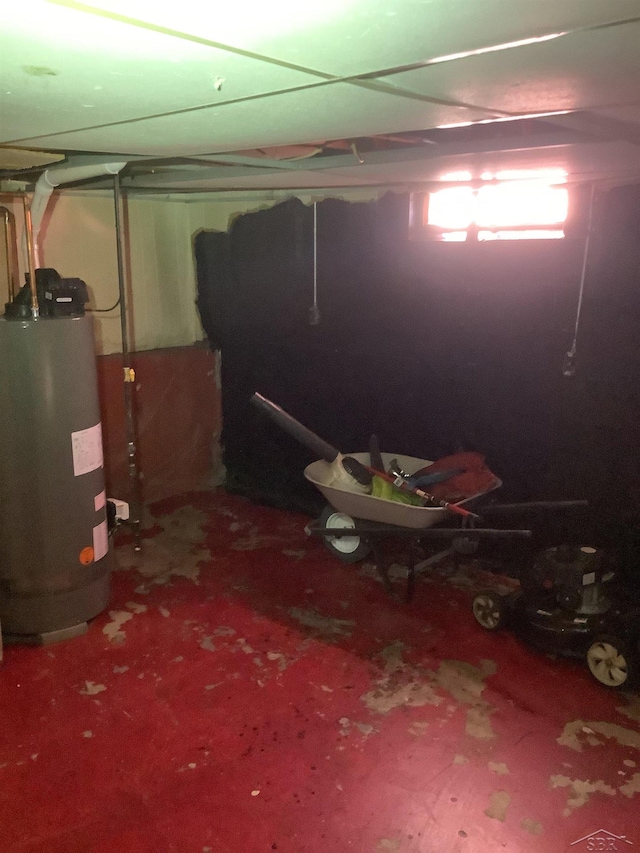 4135 Gallagher St, Saginaw, MI 48601 - basement featuring water heater and carpet floors