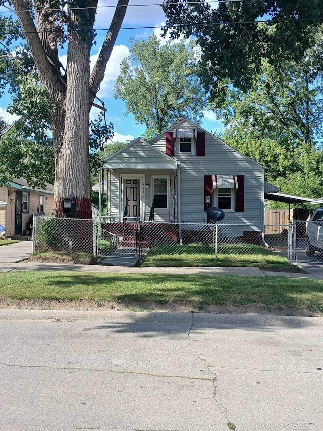 4135 Gallagher St, Saginaw, MI 48601 - view of front of house featuring a carport