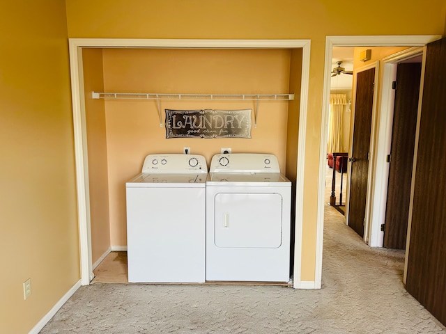 washroom with ceiling fan, independent washer and dryer, and light carpet